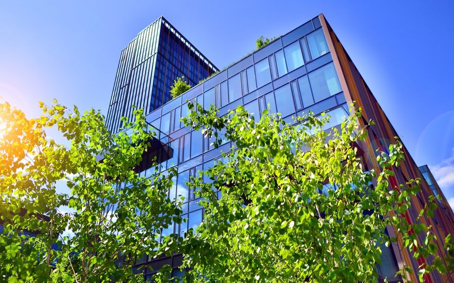 Sustainable,Glass,Office,Building,With,Trees,For,Reducing,Carbon,Dioxide.